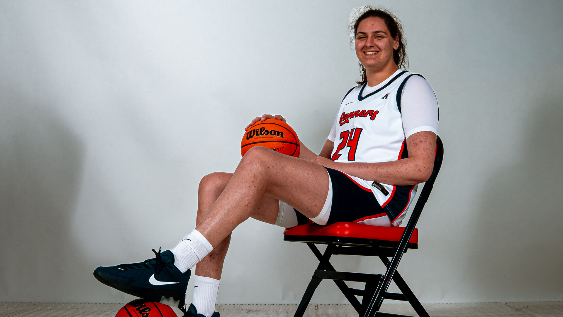 Emily Hunter sitting in chair